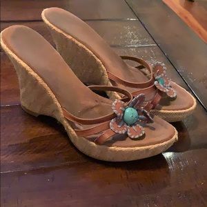 Wedges with teal flower